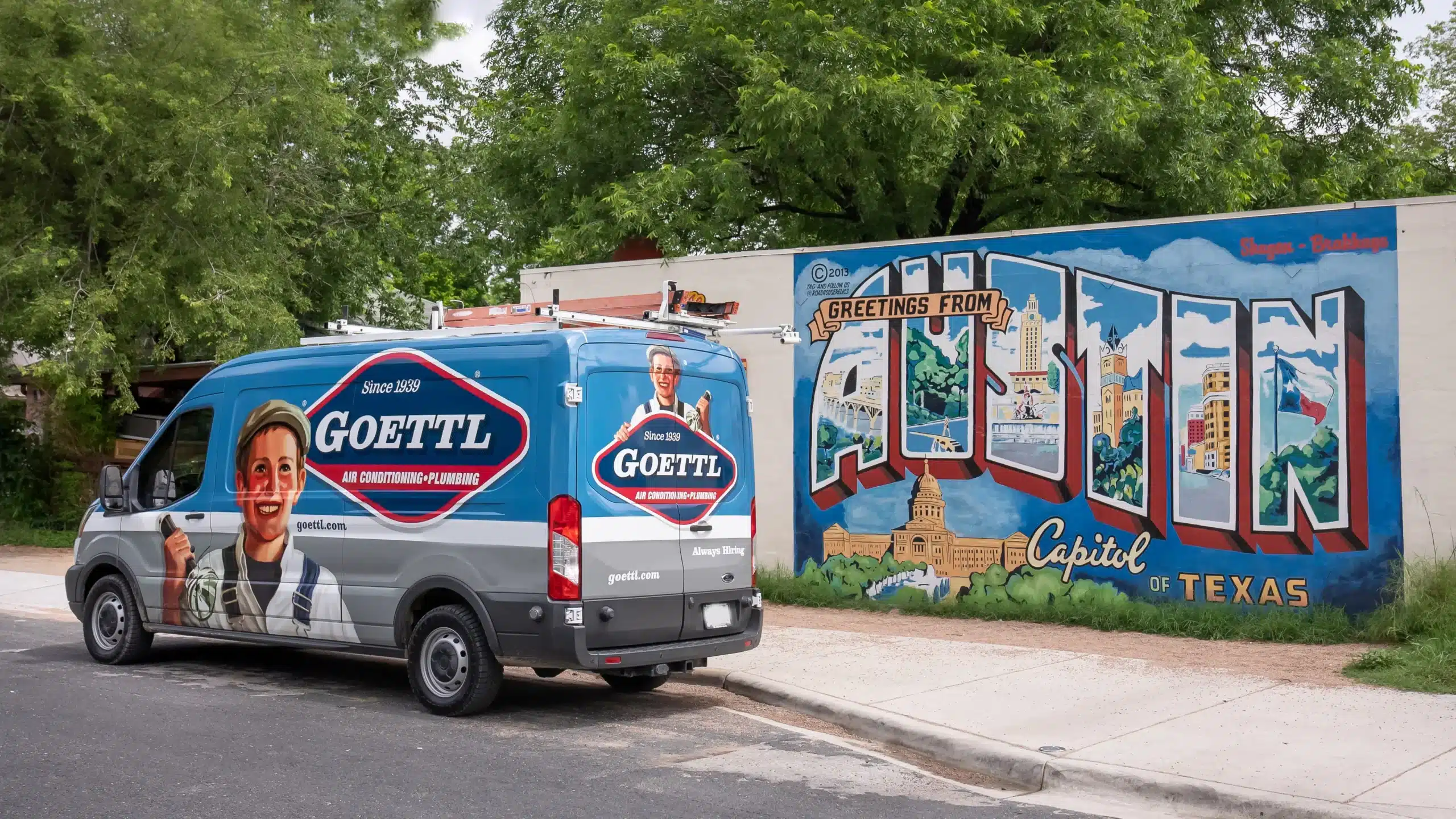 Goettl van in front of the Austin city art